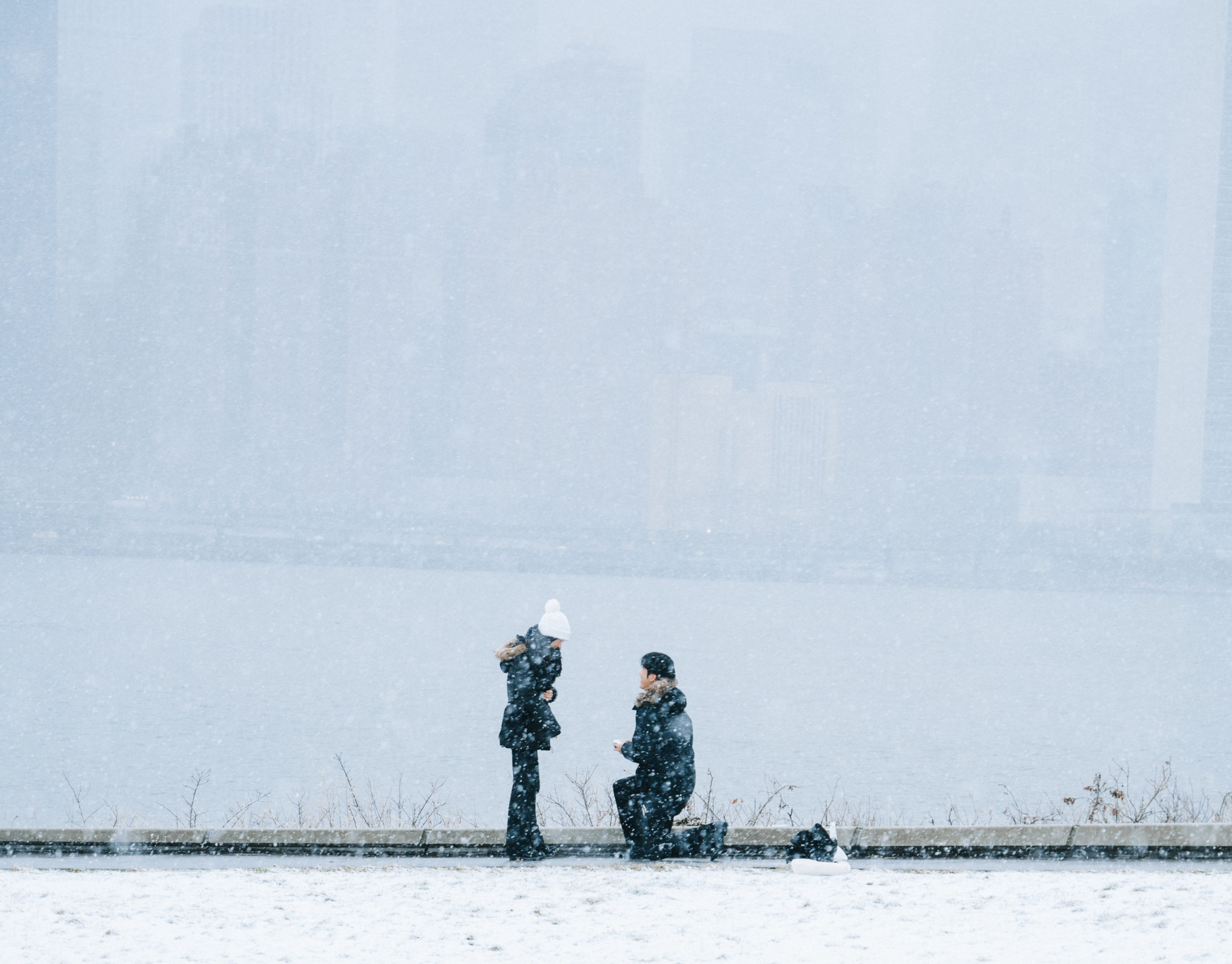 Lisa and Alex in the snow by the water